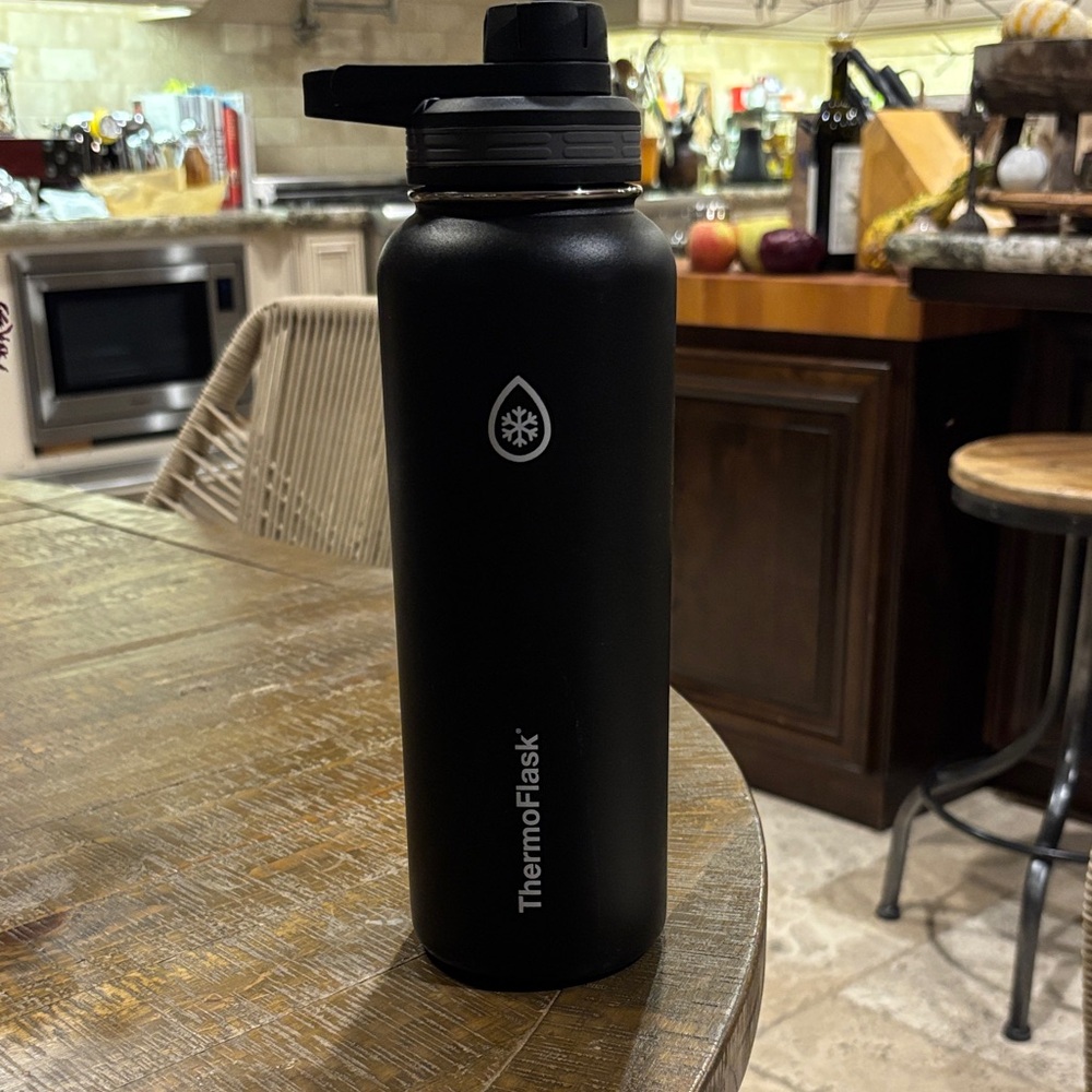 ThermoFlask black powder coated vacuum insulated 40 ounce water bottle